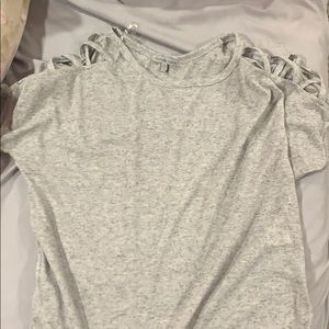 Top with open, criss-cross arms